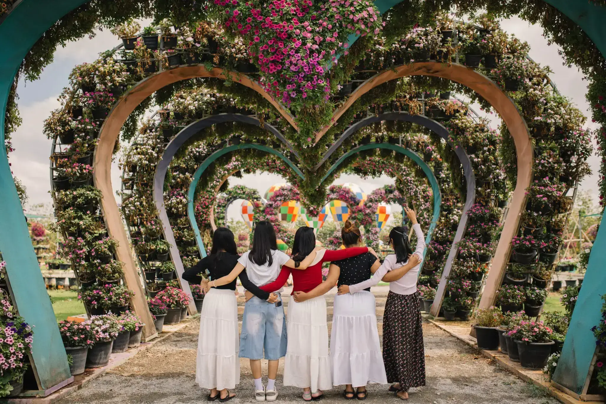 A group of women standing next to each other.
