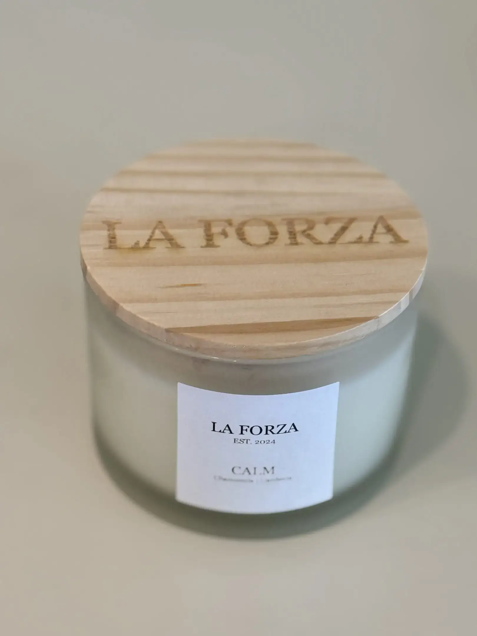 A candle that is sitting on the table.